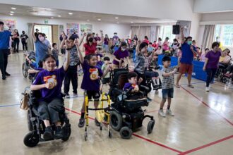 超越障礙　八里教養院運動會　腦麻生克服挑戰舉聖火　共創無障礙運動精神