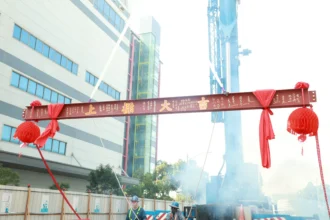 高軟二期首棟大樓今上梁　預計年底完工　估年產值17億元」