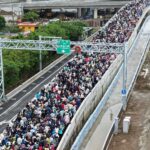 見證世紀地標　淡江大橋健行創紀錄　十萬人潮擠爆淡水